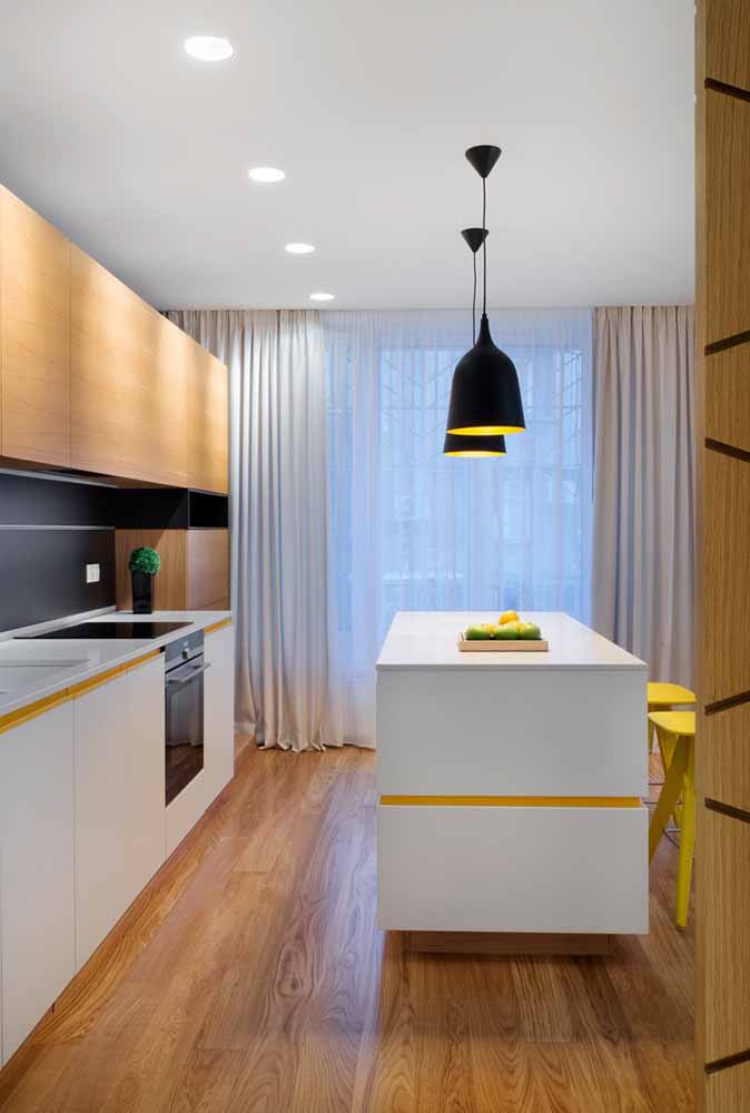 Invista em pendentes na sua ilha para iluminar a sua cozinha e dar um toque de modernidade. Lembrando que os pendentes podem se enquadrar perfeitamente ao estilo de decoração da sua casa/ambiente