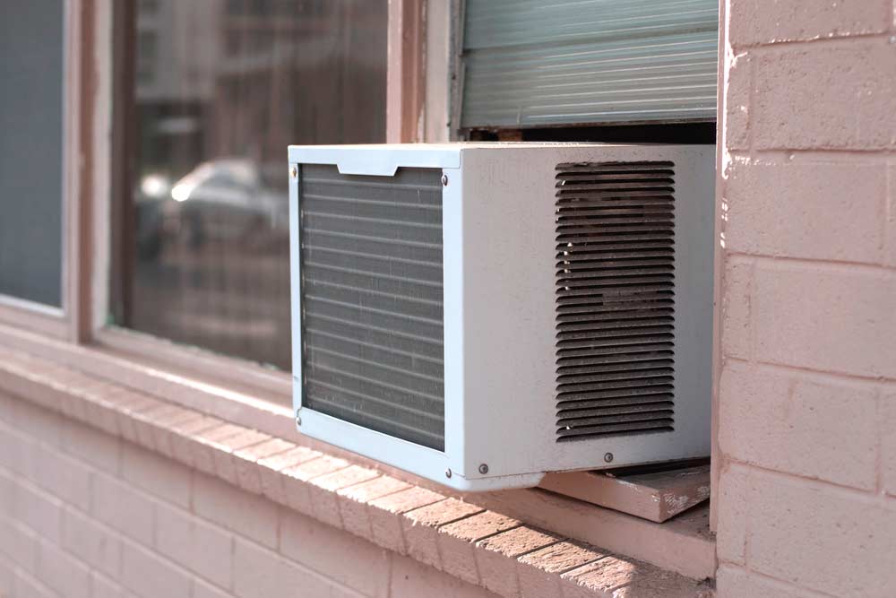 Como limpar ar condicionado de janela