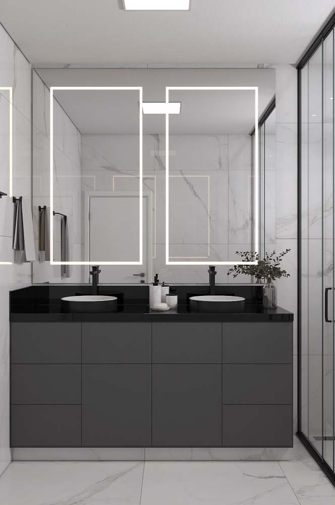 Para um banheiro minimalista, a bancada de granito preto é a melhor pedida